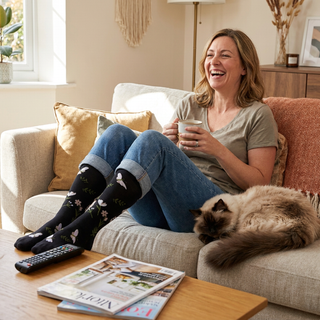 women wears black garden compression socks 